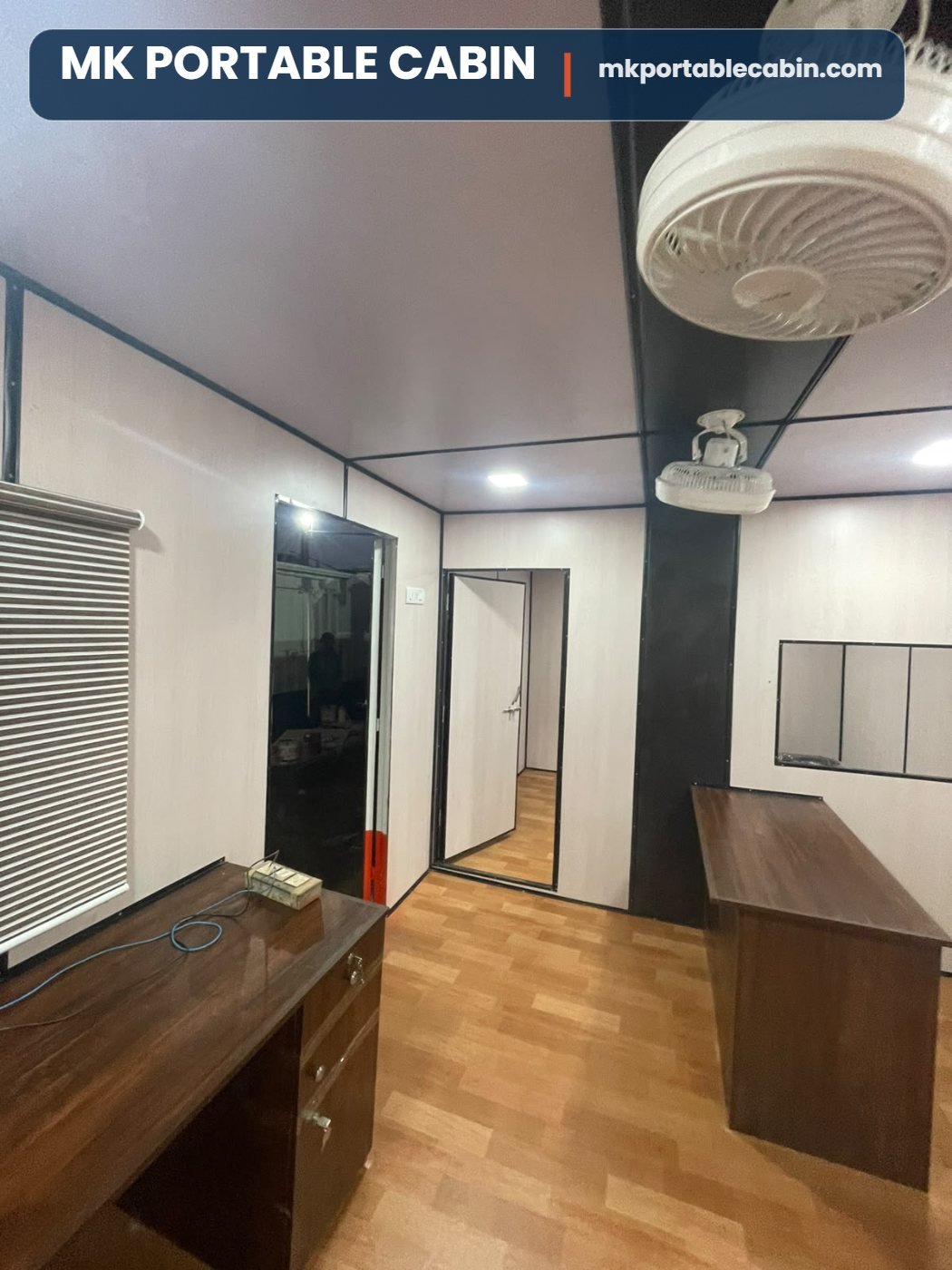 Manager table and internal partition inside 20 x 10 portable office cabin