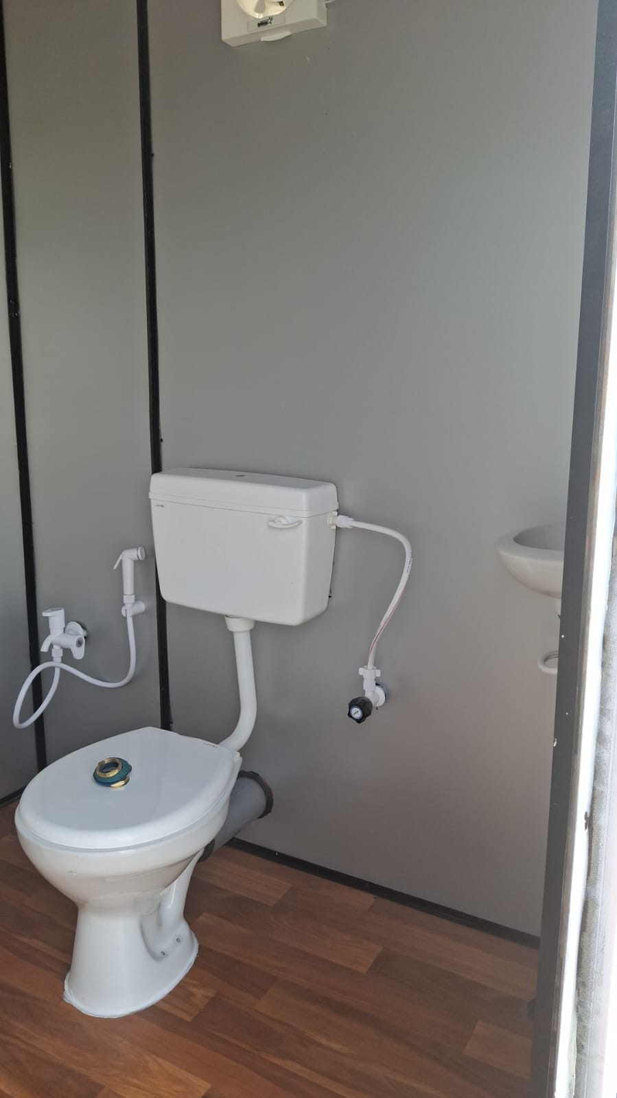 Interior of a portable toilet cabin by MK Portable Cabin